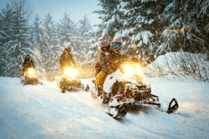 Two snowmobiles in snow