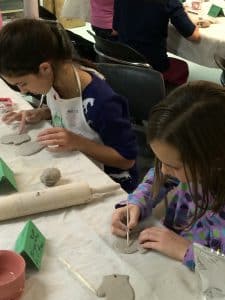 Kids working with clay