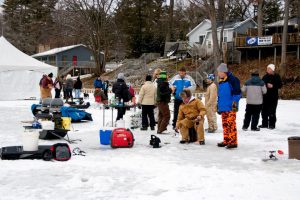 People ice fishing at D2D