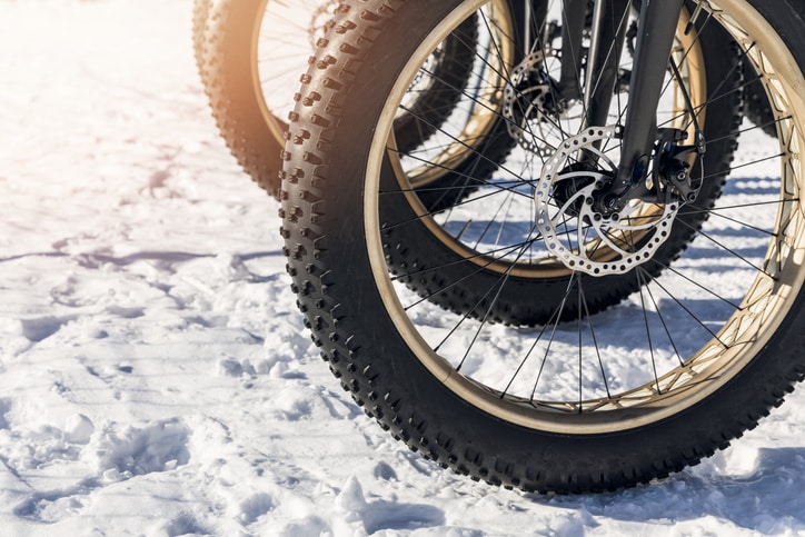 close up of fatbike tire in the snow