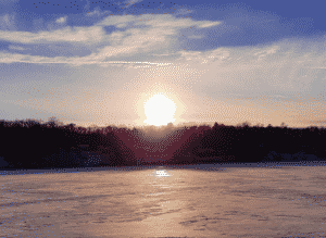 Frozen lake at sunset